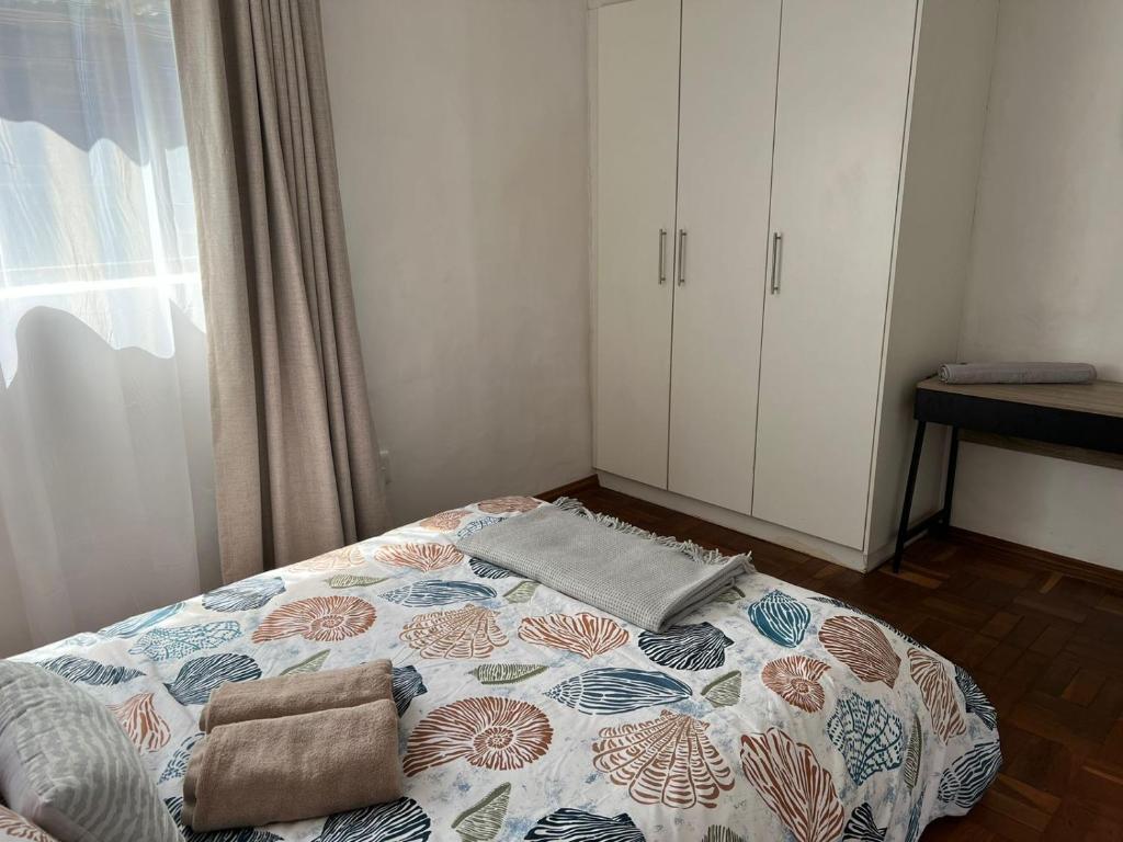 Postel nebo postele na pokoji v ubytování Nabeelah's Guesthouse