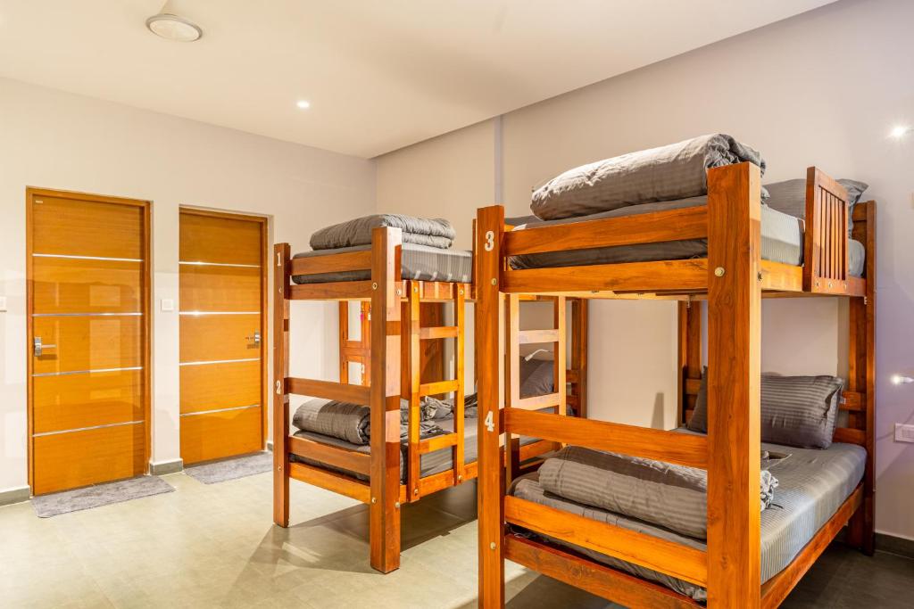K Mansion - Cama En La Habitación Del Dormitorio Mixto De 8 Camas