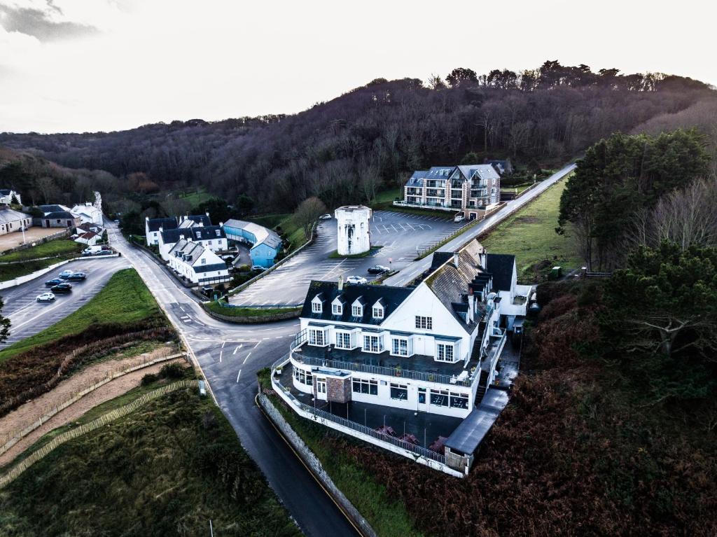 an aerial view of a large house in a town at The Prince Of Wales Hotel in St Ouen's