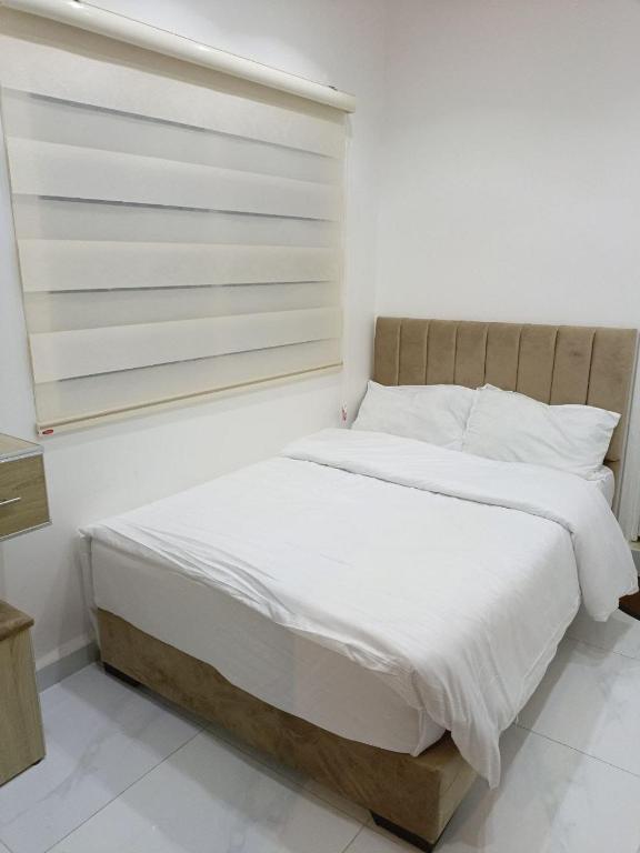 Postel nebo postele na pokoji v ubytování Mussa Spring Hotel