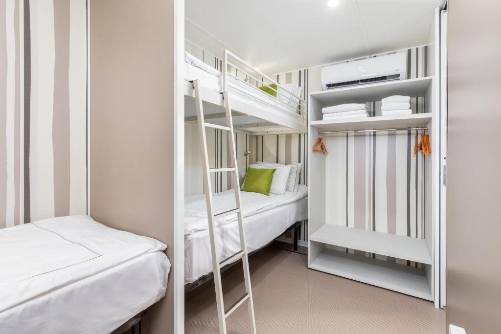 a bunk bed room with bunk beds and a bunk bed at Arena Stoja Camping Homes in Pula