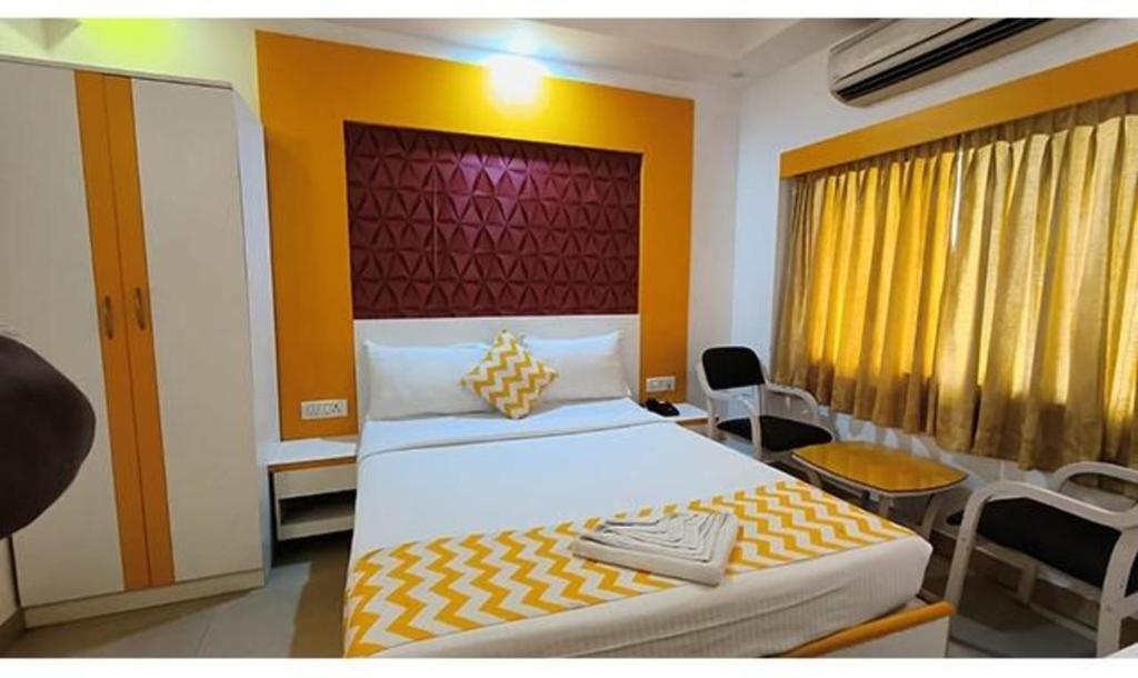 Postel nebo postele na pokoji v ubytování FabHotel Prime Stalin Pleasant Park - Triplicane