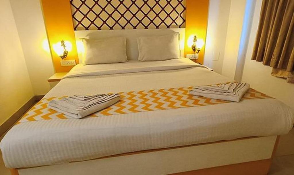 Postel nebo postele na pokoji v ubytování FabHotel Prime Stalin Pleasant Park - Triplicane