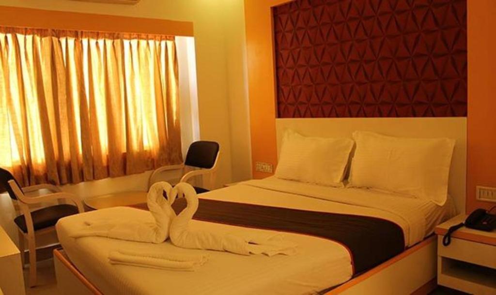Postel nebo postele na pokoji v ubytování FabHotel Prime Stalin Pleasant Park - Triplicane