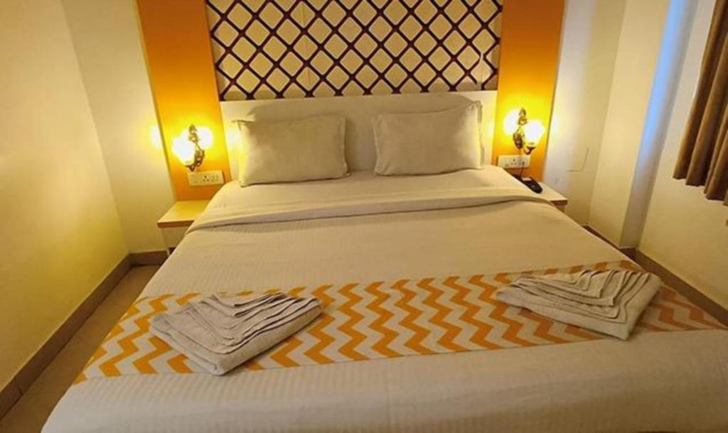 Postel nebo postele na pokoji v ubytování FabHotel Prime Stalin Pleasant Park - Triplicane
