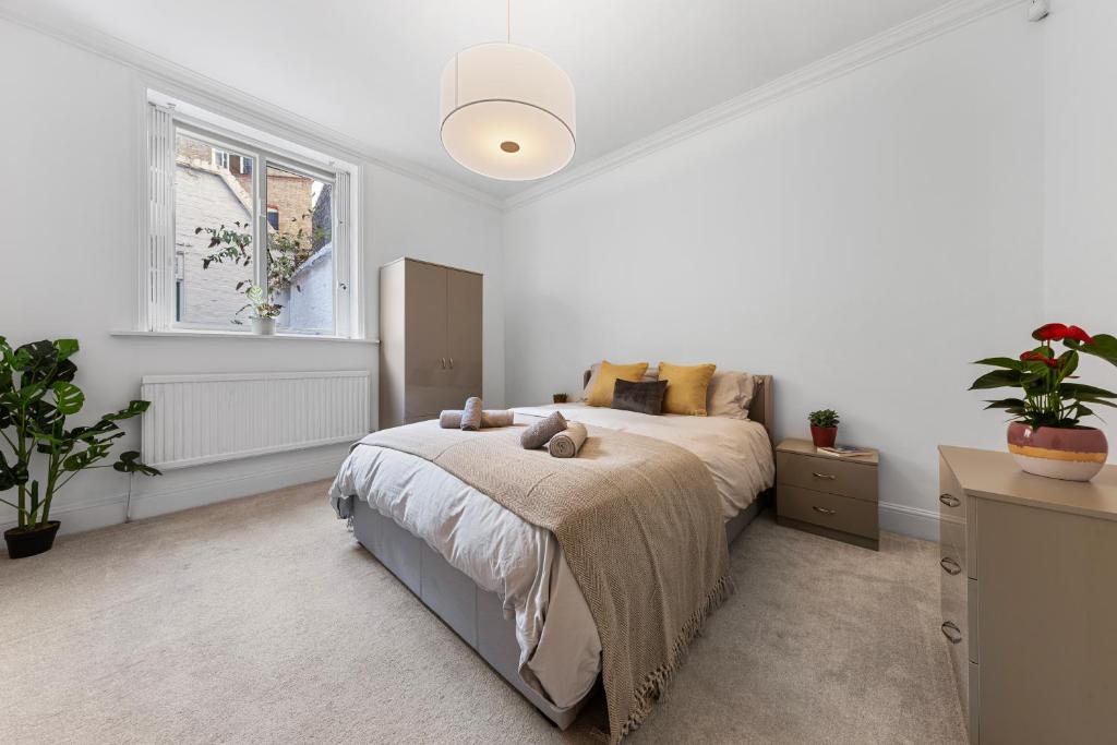 تخت لوکس 2 تخته هارودز با پاسیو - Harrods 2 Bed Lux Flat w/patio، تخت لوکس 2 تخته هارودز با پاسیو