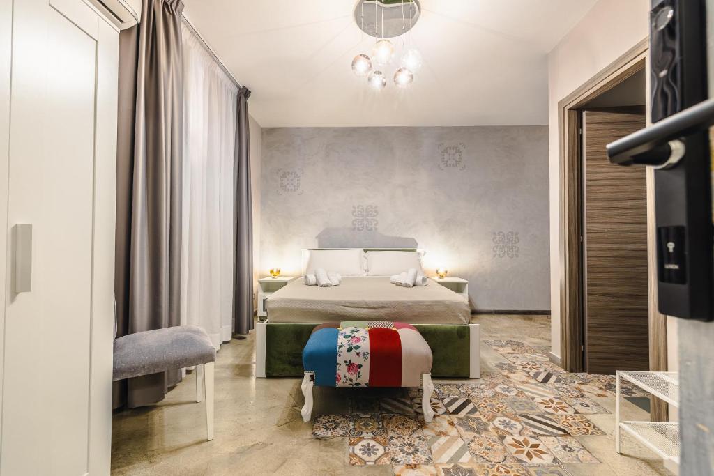 Postel nebo postele na pokoji v ubytování BeB Omare Agrigento