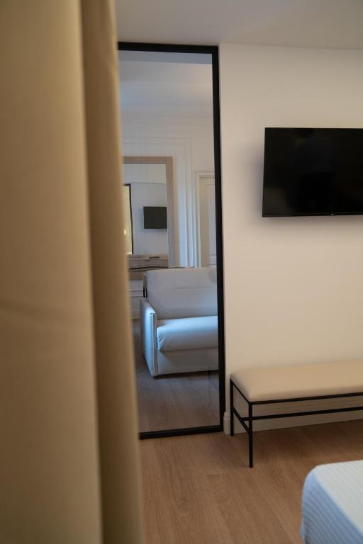 Łóżko lub łóżka w pokoju w obiekcie Albergo Bianchi Stazione