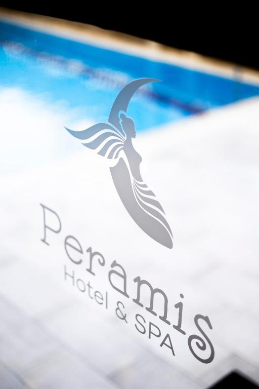 a logo for a hotel and spa at Peramis Hotel & Spa in Antalya