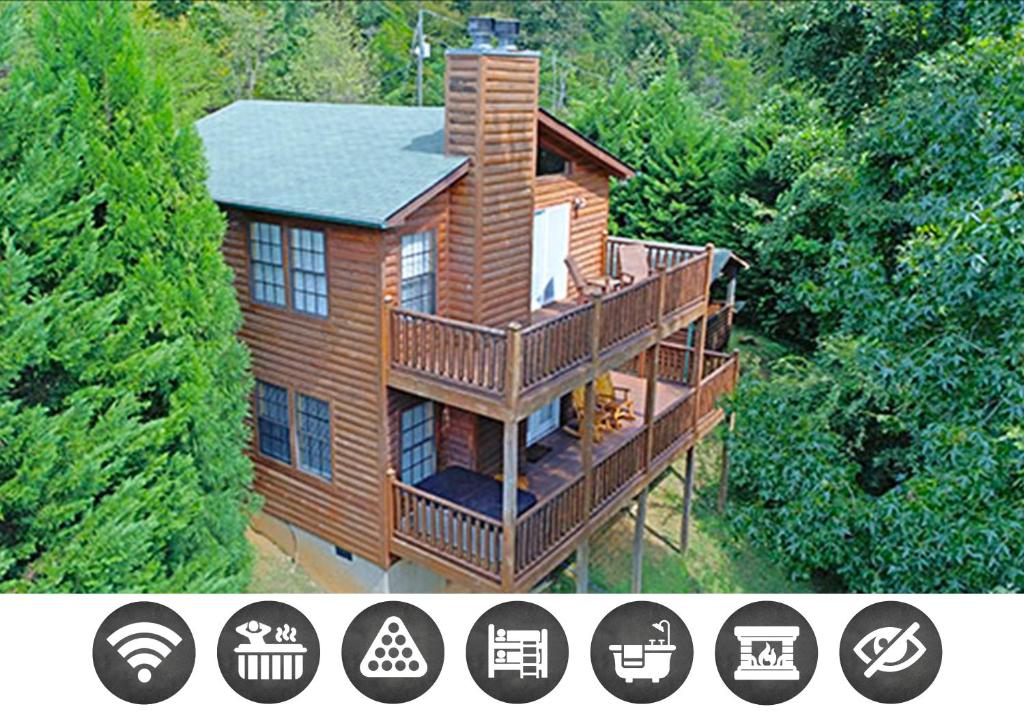 an overhead view of a log cabin in the woods at Paw Prints Mountain View Cabin in Sevierville