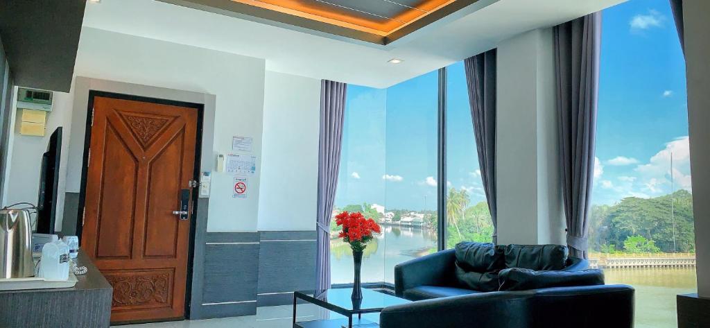 Posezení v ubytování River Hotel Pattani