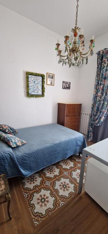 A bed or beds in a room at La Baronessa