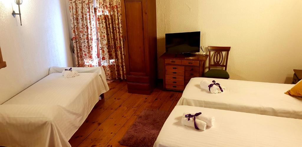 Postel nebo postele na pokoji v ubytování Hotel Rincón Castellano