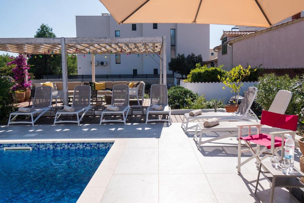 Bazén v ubytovaní Apartments Villa Adriana II alebo v jeho blízkosti
