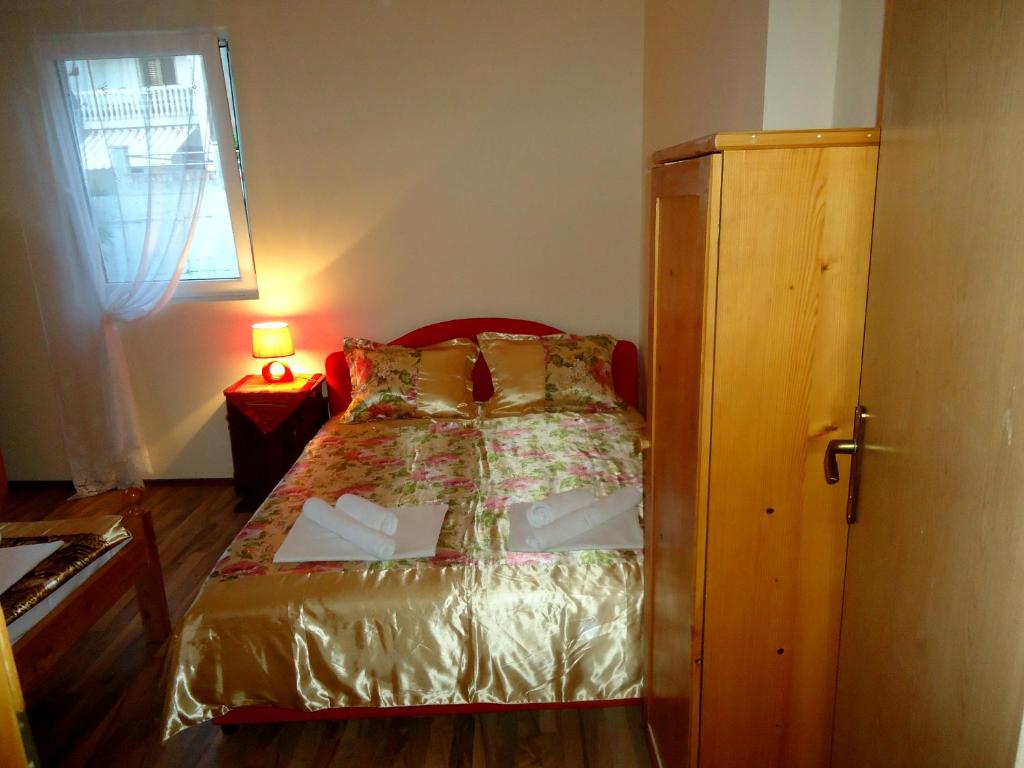 Кровать или кровати в номере Apartment Vukanic