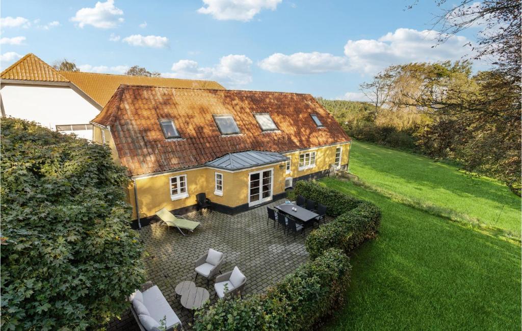 an aerial view of a house with a rusty roof at Pet Friendly Home In Lgstrup With Kitchen in Løgstrup