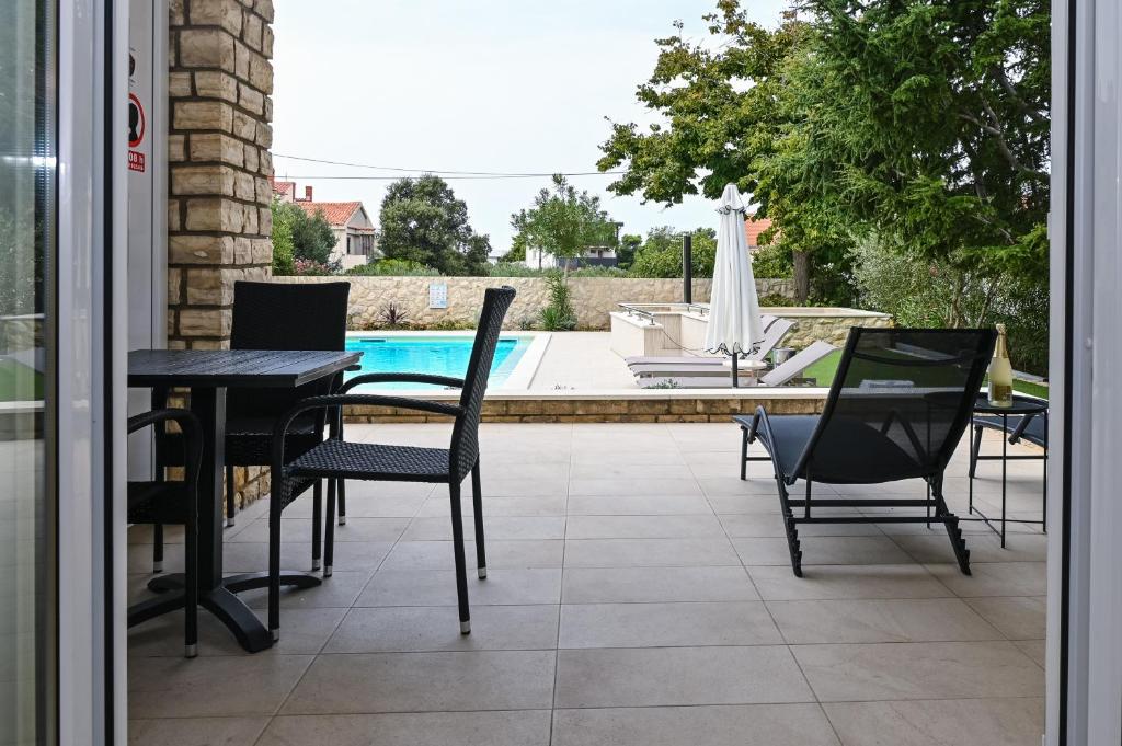 Bazén v ubytování Seagull Pool Apartments & Studios nebo v jeho okolí