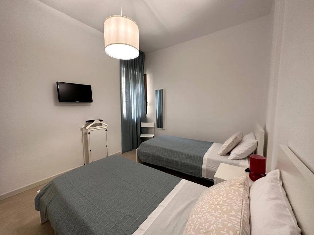 Letto o letti in una camera di Kennedy38