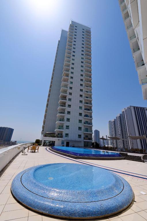 Bazén v ubytování EliteRetreat - SeaView - Gym & Pool Access - Reem Island nebo v jeho okolí