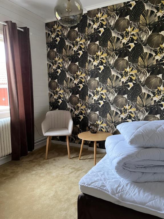 Postel nebo postele na pokoji v ubytování Vintergatans Rum