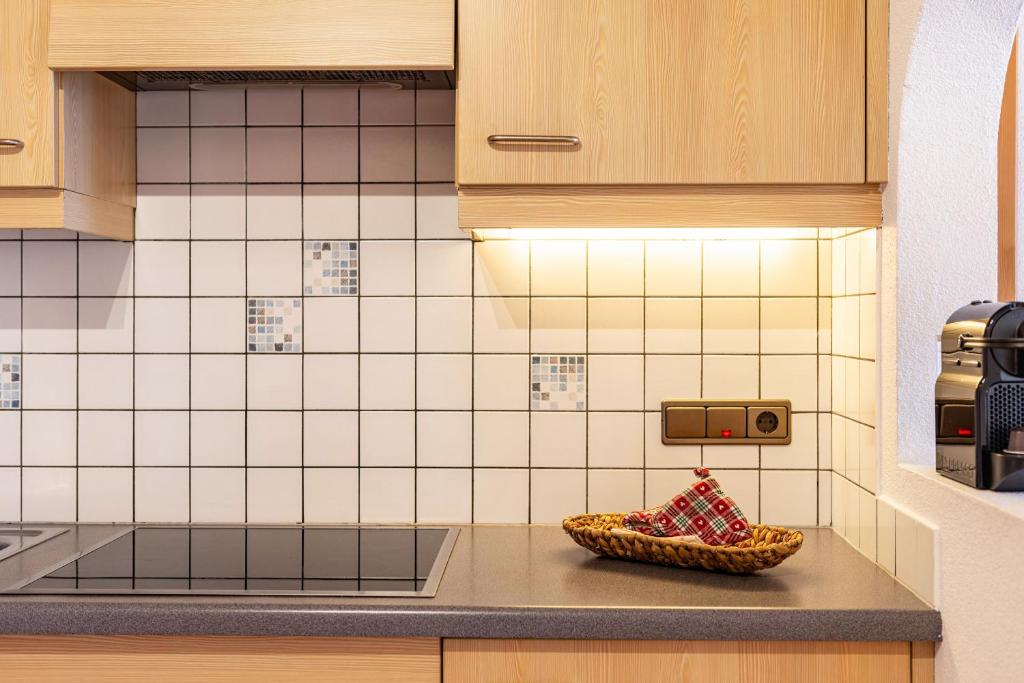 Kuchnia lub aneks kuchenny w obiekcie Häuslerhof App Pinus