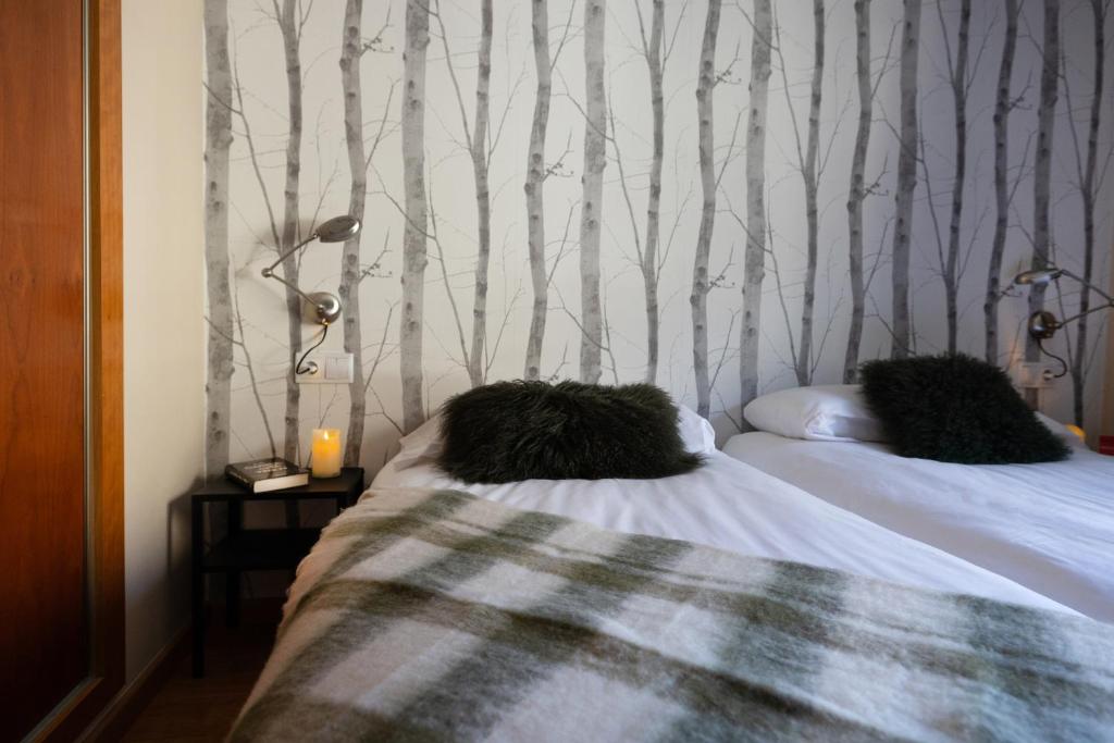 Postel nebo postele na pokoji v ubytování Apartaments Sant Bernat