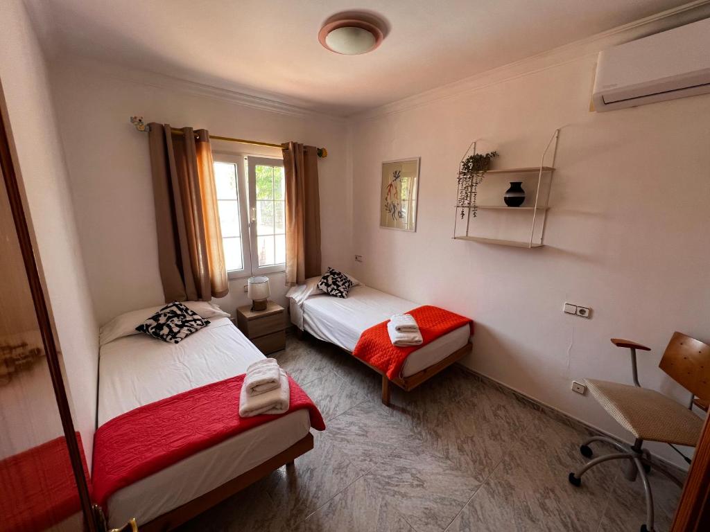 Postel nebo postele na pokoji v ubytování Villa Savanna
