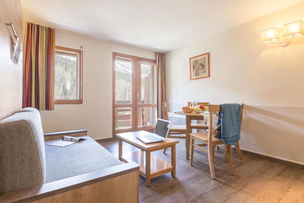 Гостиная зона в Résidence Pierre & Vacances Les Ravines