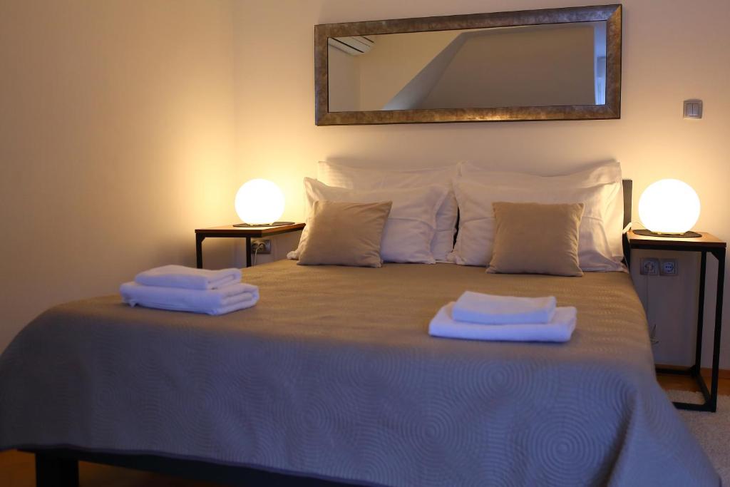 Posteľ alebo postele v izbe v ubytovaní D&G Apartments Zagreb