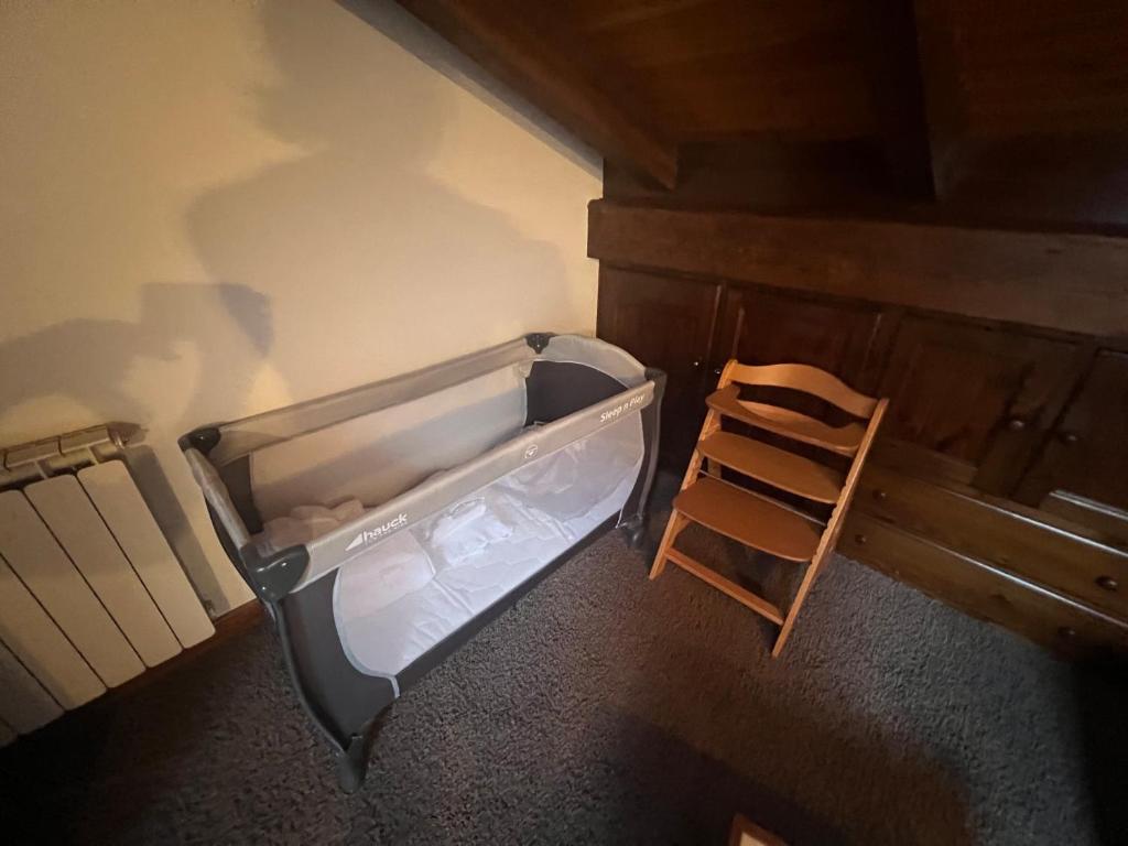 A bed or beds in a room at Ferienhaus-Chalet Breuil-Cervinia Valtournenche