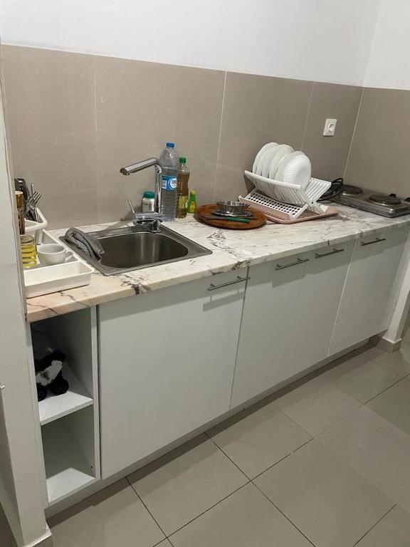 Kuchyň nebo kuchyňský kout v ubytování Maison Residencial casa de ferias