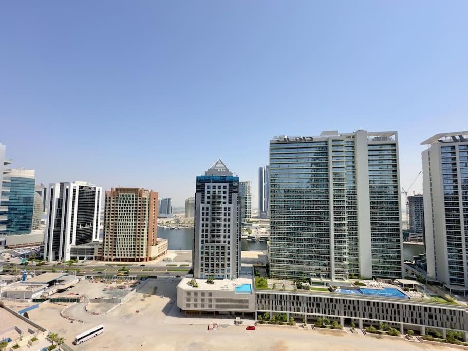 Fotografie z fotogalerie ubytování Dar Vacation - Unique Luxury White 2BR Apartment Near Burj Khalifa v Dubaji