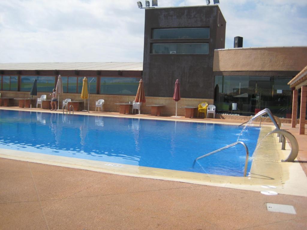 Piscina en o cerca de Hospedium Hotel Los Periquitos