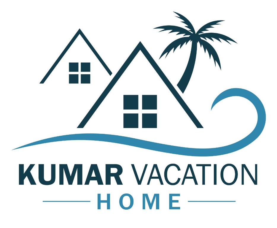 il logo di una casa e di una palma sulla spiaggia di KumarVacation Martintar 70 Gray Unit 1 a Nadi