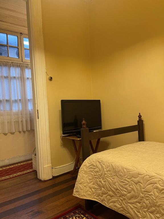 TV a/nebo společenská místnost v ubytování Casa dos Leones