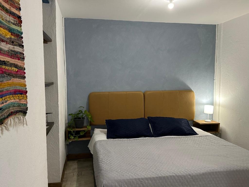 Postel nebo postele na pokoji v ubytování Hotel Casa Lucca
