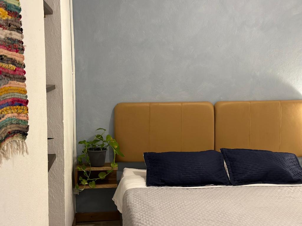 Postel nebo postele na pokoji v ubytování Hotel Casa Lucca