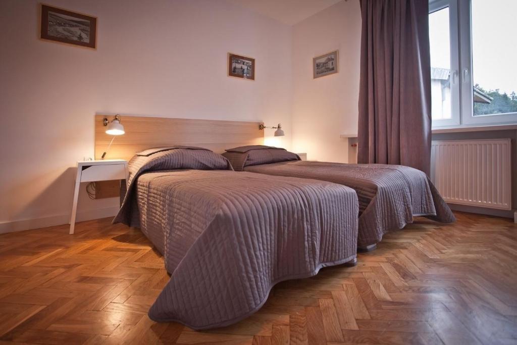 Tempat tidur dalam kamar di Willa Basztowa