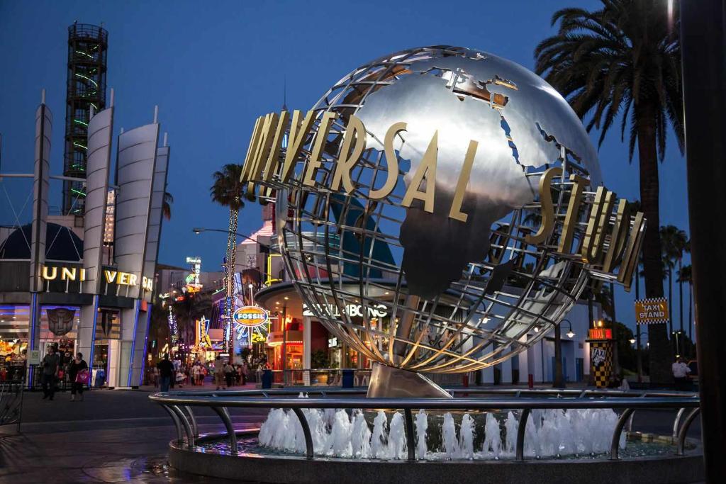 a large metal globe in the middle of a street at Luxury Suite near Universal Studios in Los Angeles