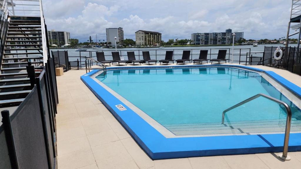 a large swimming pool on top of a building at By the Beach Rentals in Clearwater Beach
