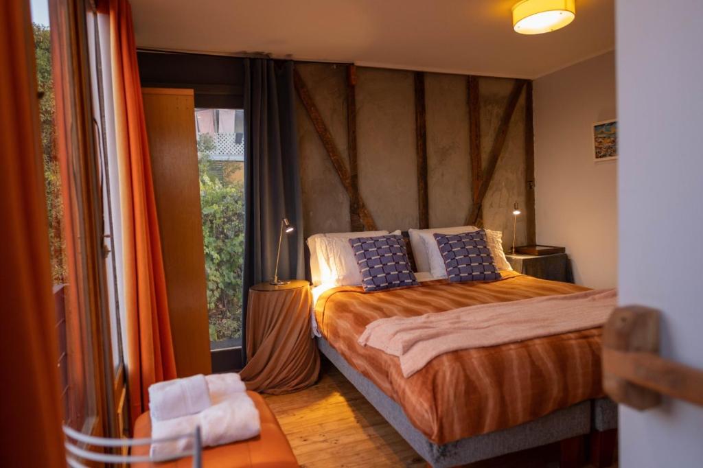 Postel nebo postele na pokoji v ubytování Patio Ferreiro B&B