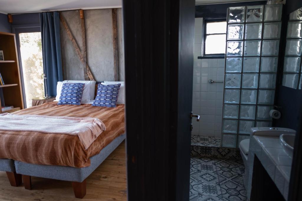 Postel nebo postele na pokoji v ubytování Patio Ferreiro B&B