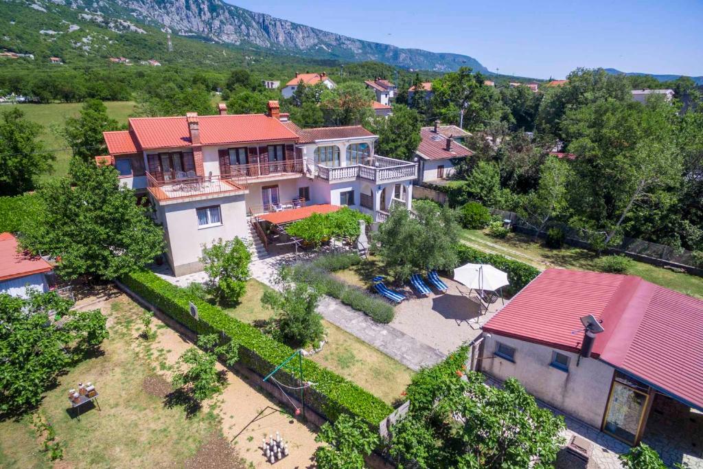 an aerial view of a house with a yard at Apartment in Tribalj 33528 in Tribalj