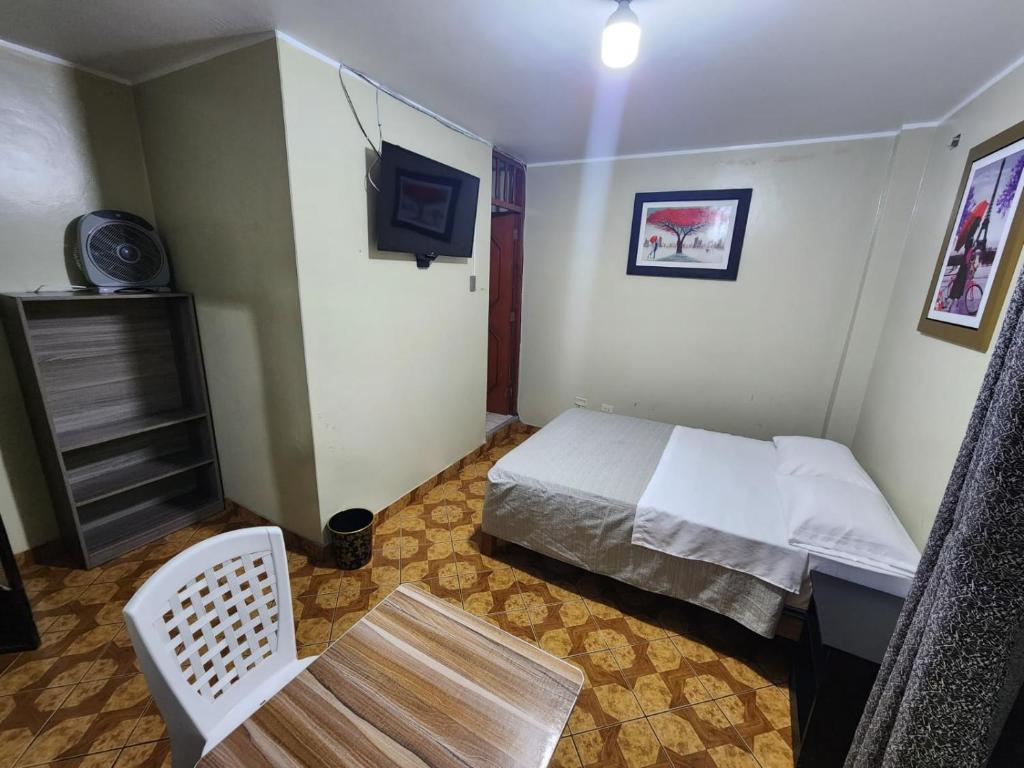 Letto o letti in una camera di Hostal Continental