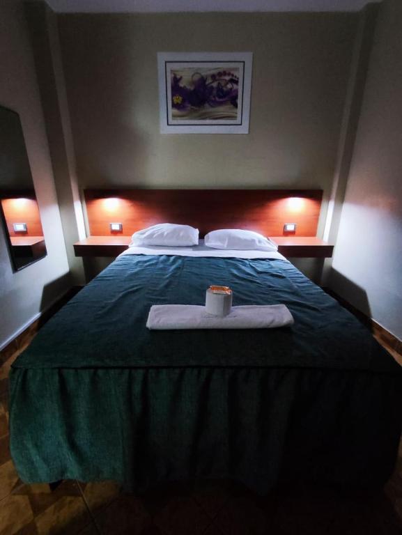 Letto o letti in una camera di Hostal Continental