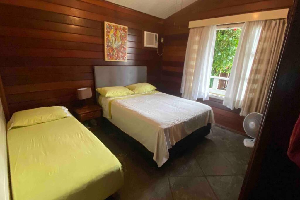 En eller flere senge i et værelse på Residencial Flamingo com Piscina em Morretes-PR