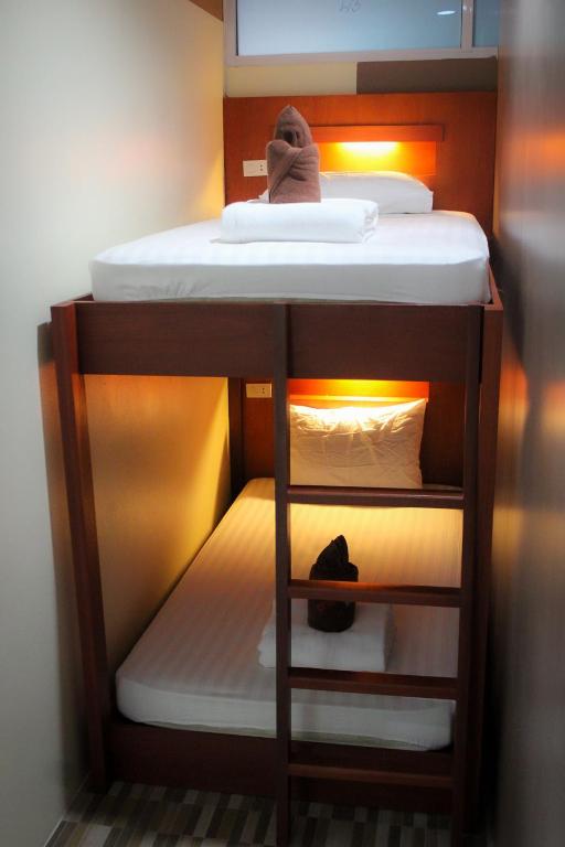 Postel nebo postele na pokoji v ubytování Phangan Barsay Hostel