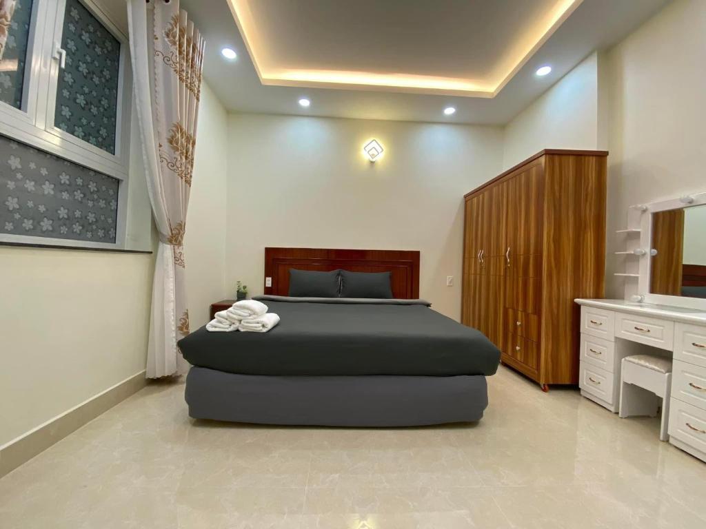 Postel nebo postele na pokoji v ubytování Da Quy Harmony Homestay