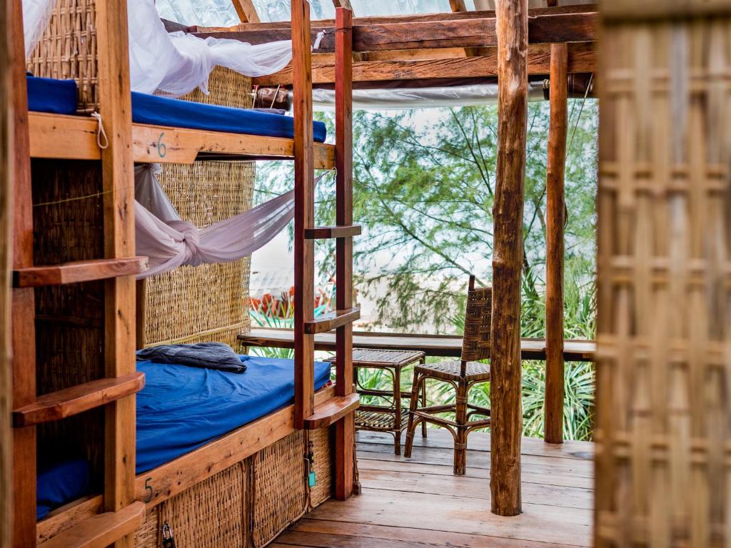 Postel nebo postele na pokoji v ubytování Kactus-Your Island Sanctuary On Koh Ta Kiev
