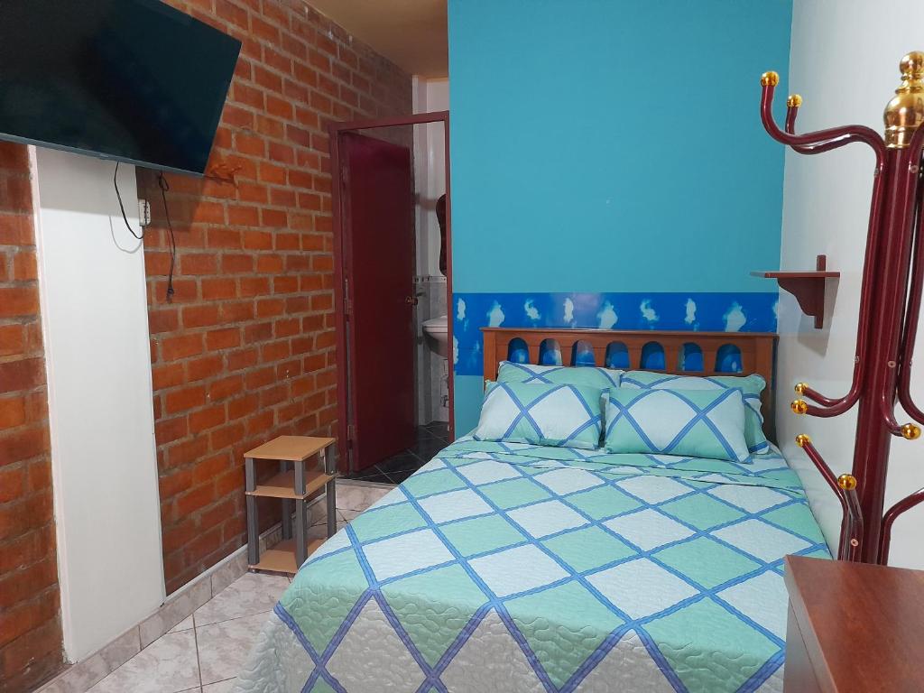 Postel nebo postele na pokoji v ubytování Nasca Trails B&B